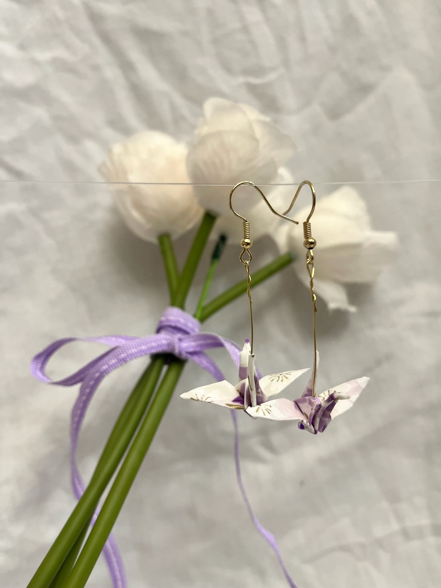 Small light purple crane earrings